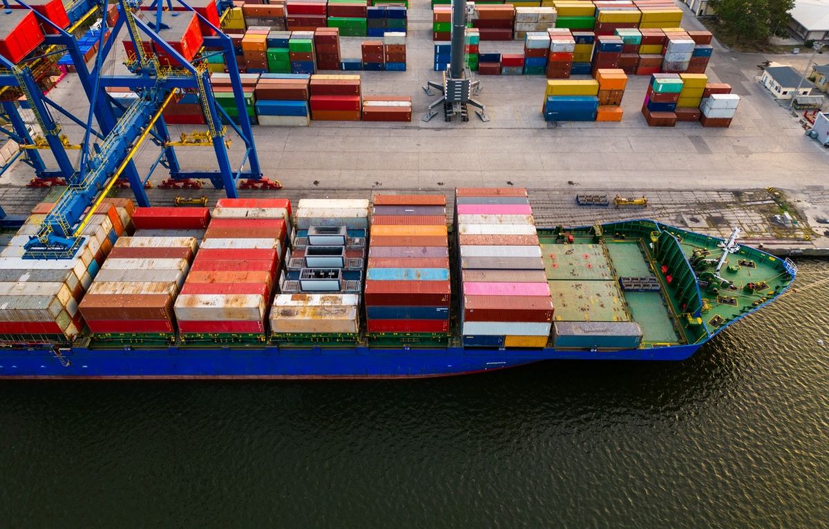  a container ship in terminal at the port