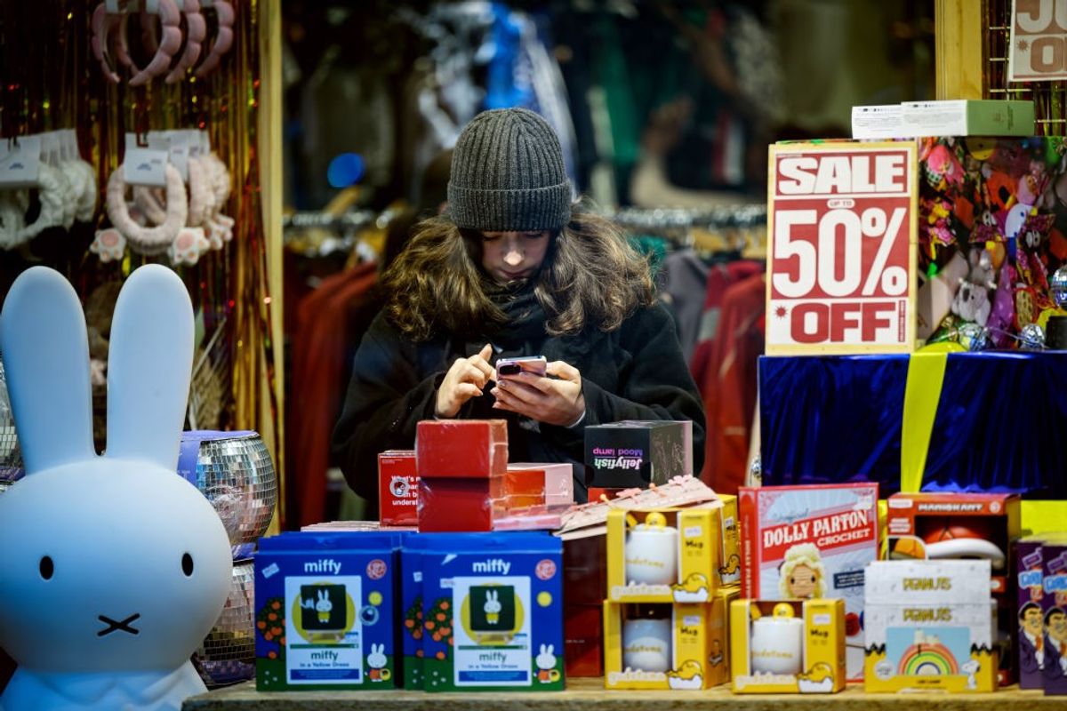 A woman browses some of the Christmas gift ideas in a store on December 13, 2024 in London, England.