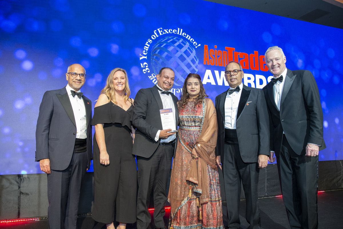 Bharat Khunti receives Impulse Retailer of the Year award at the 2024 Asian Trader Awards 