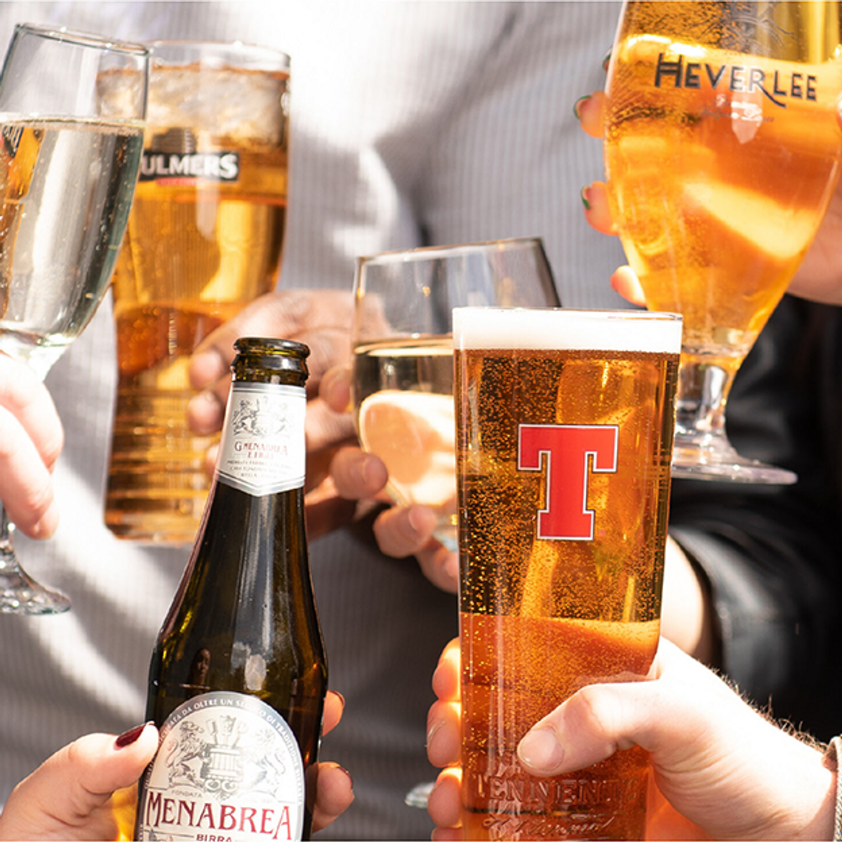 C&C Group CEO Roger White reviews 2025 financials with Tennent’s and Bulmers cans, highlighting earnings growth amid challenges.