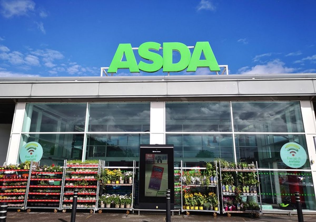 Asda Workers protest march with life-size cut-out of boss Manjit Dale