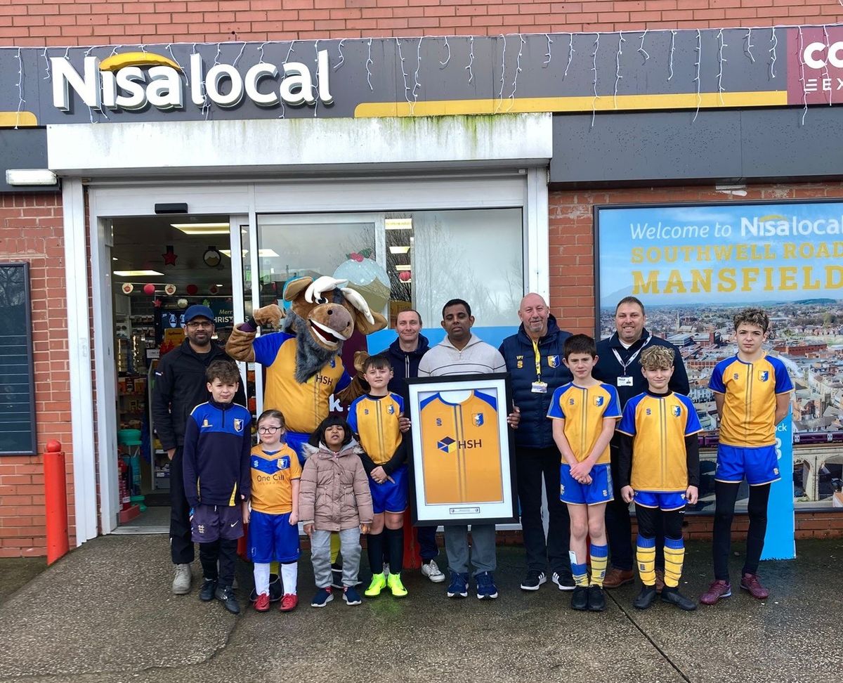 Players from Mansfield Town Ability Counts Football Club at Crossroad Service Station