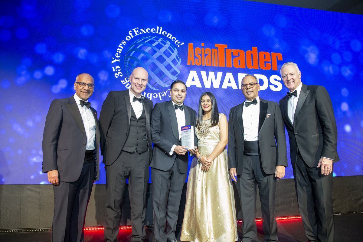 Priyesh Vekaria receives Responsible Retailer of the Year award at the 2024 Asian Trader Awards 