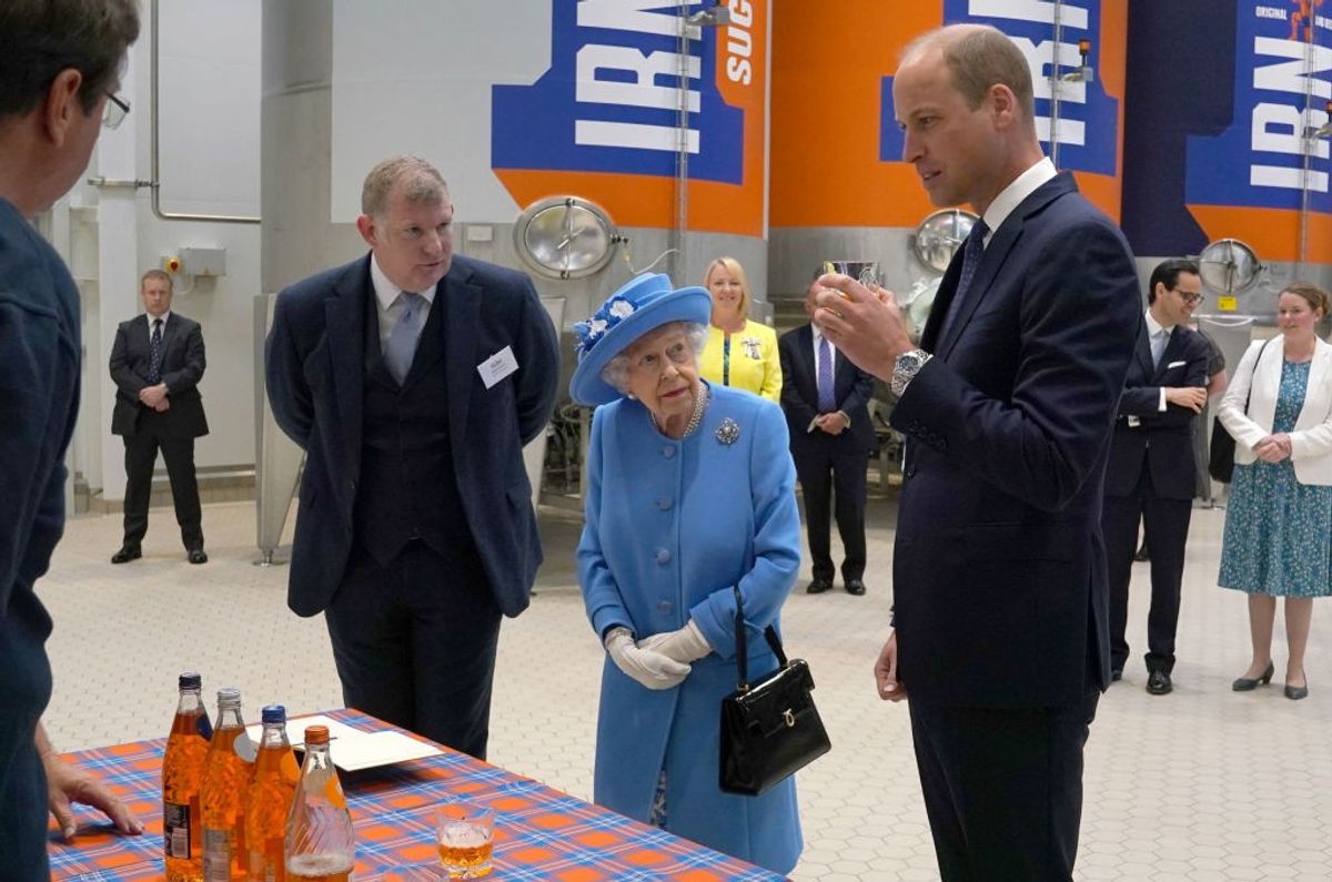 Prince William tastes the 'girders' as Queen pays visit to Irn-Bru factory