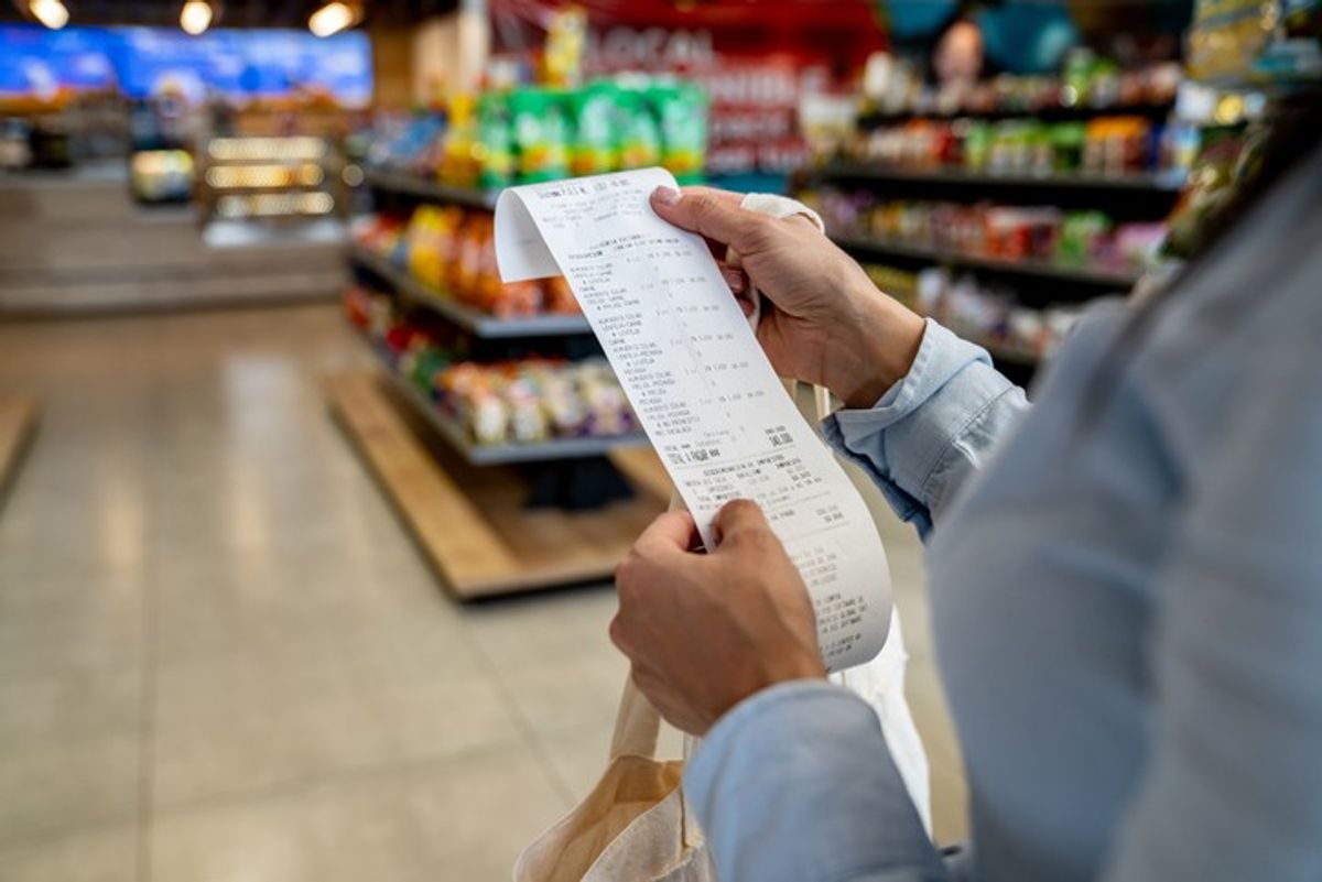 Shopping cart filled with groceries, reflecting rising food prices in the UK