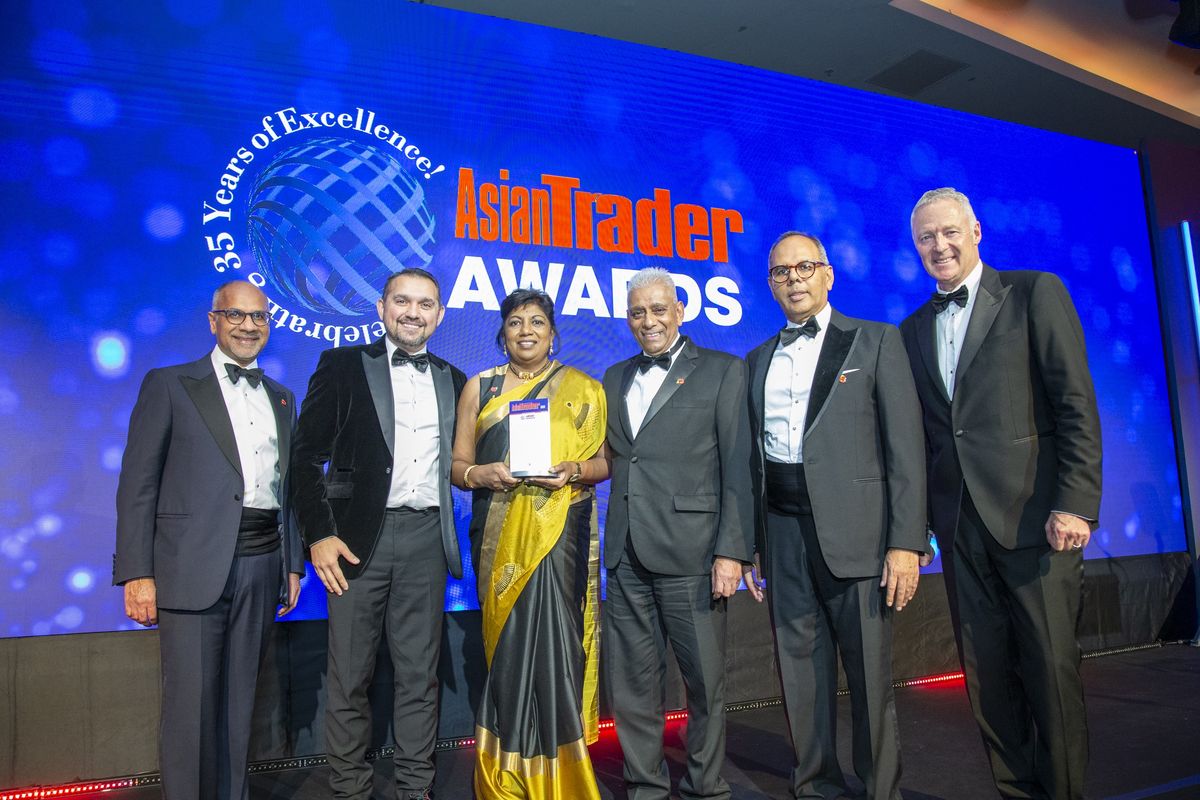 Sue Nityanandan receives Businesswoman of the Year award at the 2024 Asian Trader Awards 