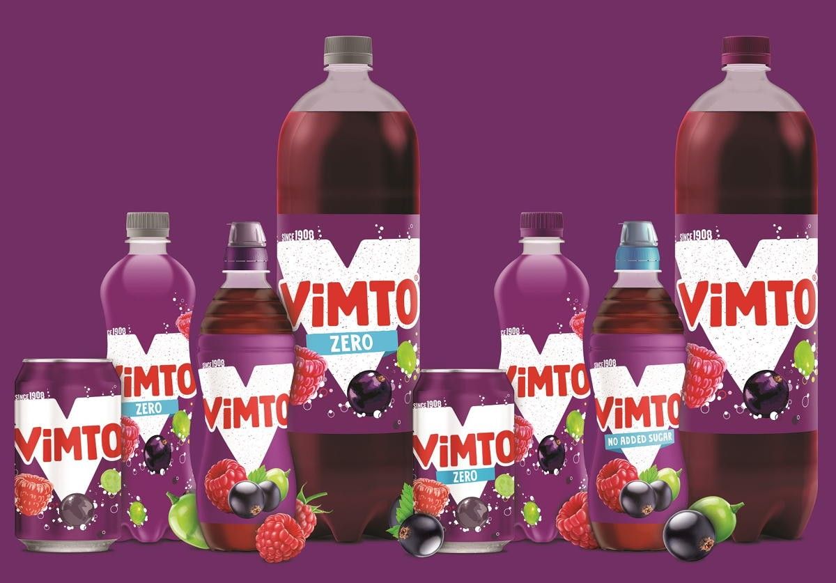 Vimto bottles on a store shelf, reflecting Nichols plc’s £172.8M sales growth 